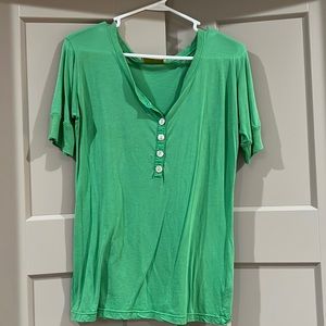 As seen on Jessica Simpson green Woo henley size 3.